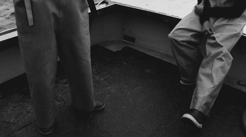 editorial image of fisherman on a boat