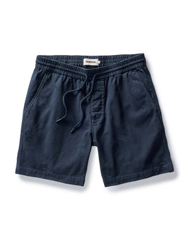 flatlay of The Apres Short in Organic Dark Navy Foundation Twill, Bottoms by Taylor Stitch