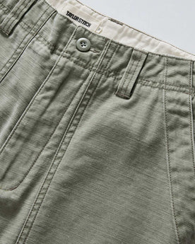 material shot of the waistband on The Surplus Short in Field Olive Reverse Sateen, Bottoms by Taylor Stitch