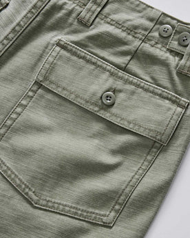 material shot of the pockets on The Surplus Short in Field Olive Reverse Sateen, Bottoms by Taylor Stitch