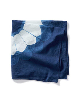 material shot of The Hand Dyed Bandana in Indigo Sunflower folded, Accessories by Taylor Stitch