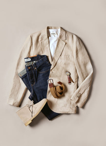 flatlay of The Sheffield Sport Coat in Natural Linen, The Organic Cotton Tee in Vintage White and The Democratic Jean in Rinsed Organic Selvage