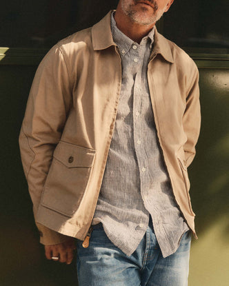 fit model showing off The Airman Jacket in Organic Khaki Foundation Twill