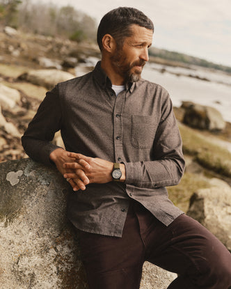 fit model sitting wearing The Jack in Timber Houndstooth