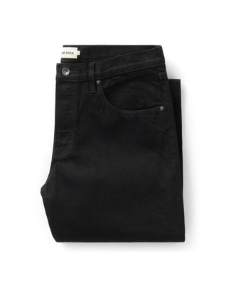 folded flatlay of The Straight Jean in Rinsed Black Organic Selvedge