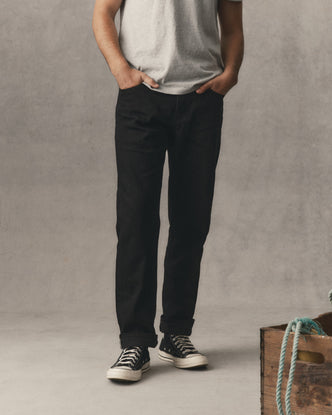 fit model wearing The Straight Jean in Rinsed Black Organic Selvedge