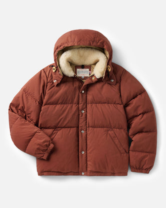 flatlay of The Down Sweater Jacket in Brick Red Waxed Ripstop