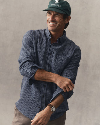 fit model adjusting the cuffs on The Jack in Indigo Basketweave Check