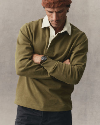 fit model showing off The Rugby Shirt in Dry Sage