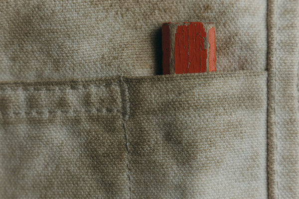 editorial image of the pocket on The Good Acre Chore Pant in Natural Canvas