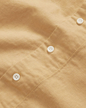 material shot of the buttons on The Short Sleeve Hawthorne in Wheat, Wovens by Taylor Stitch