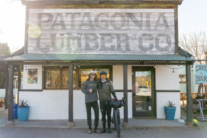Yuri and a friend standing in front of Patagonia Lumber Company