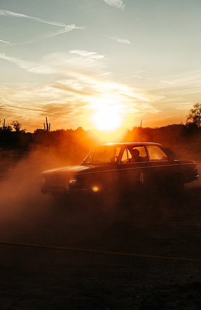 Doing donuts in the BMW, kicking up dust into the sunset.