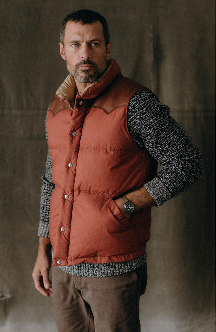 fit model posing in The Down Vest in Brick Red Waxed Ripstop