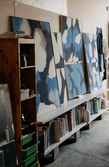 editorial image of a painting studio for The Short Sleeve Carter in Dark Navy Abstract