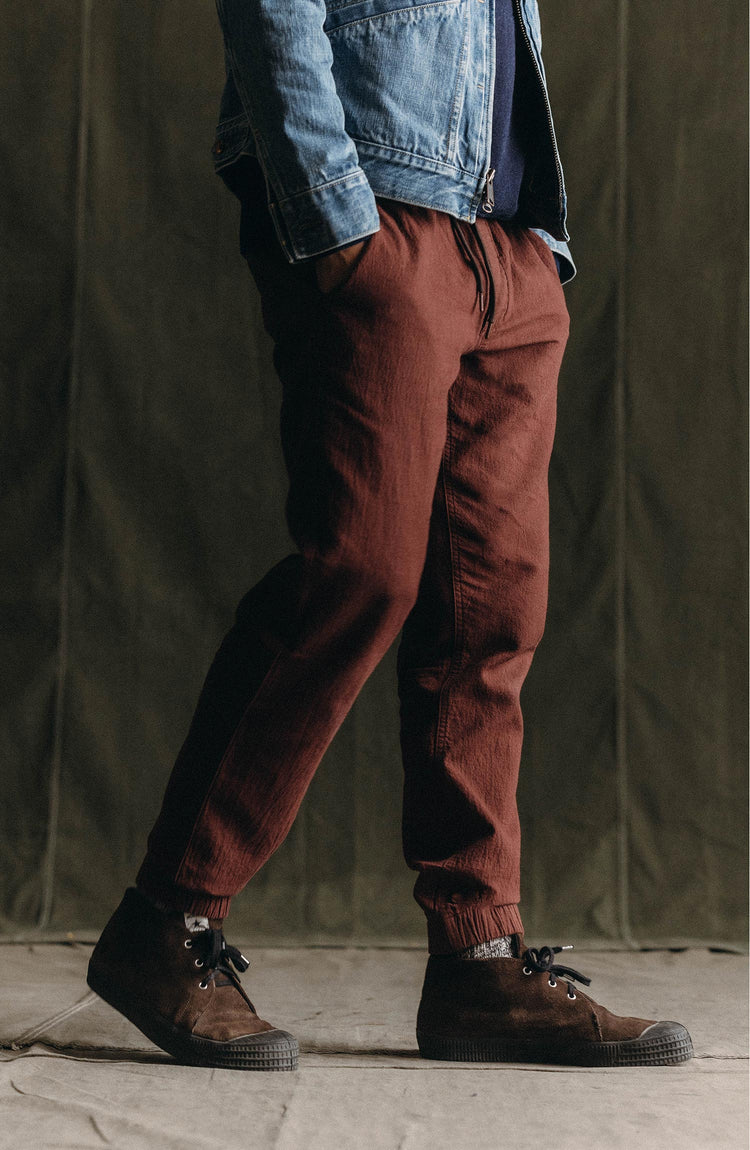 fit model posing in The Apres Pant in Burgundy Double Cloth