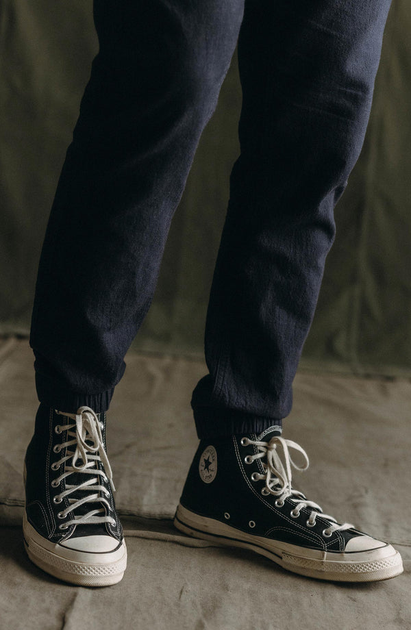 fit model showing off the cuffs on The Apres Pant in Coal Double Cloth
