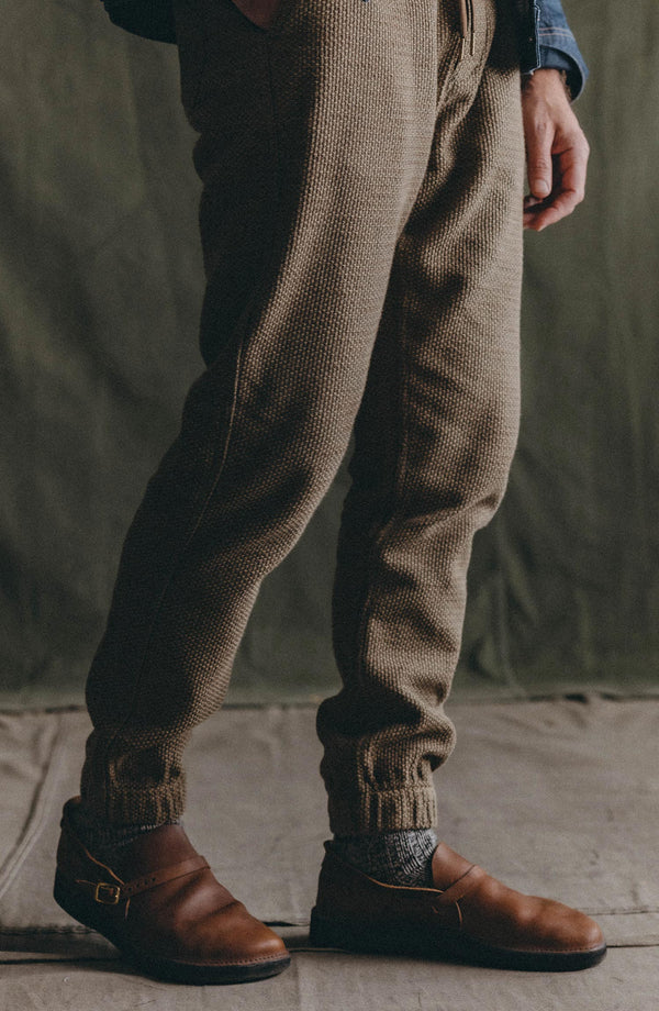 fit model walking wearing The Apres Pant in Cypress Sashiko