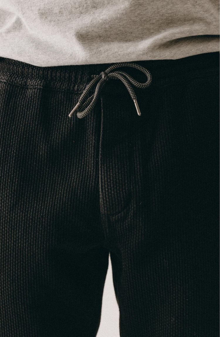 fit model posing in The Apres Pant in Black Indigo Sashiko