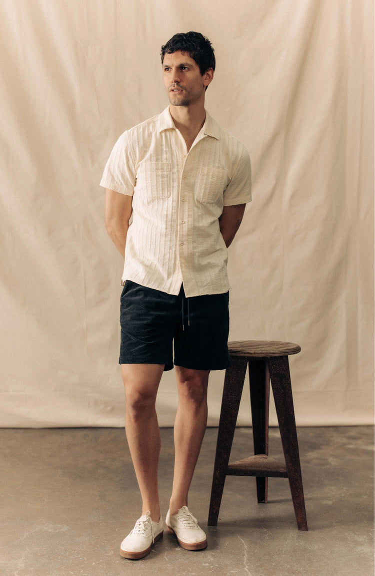 fit model showing off The Conrad Shirt in Vintage White Dobby Stripe
