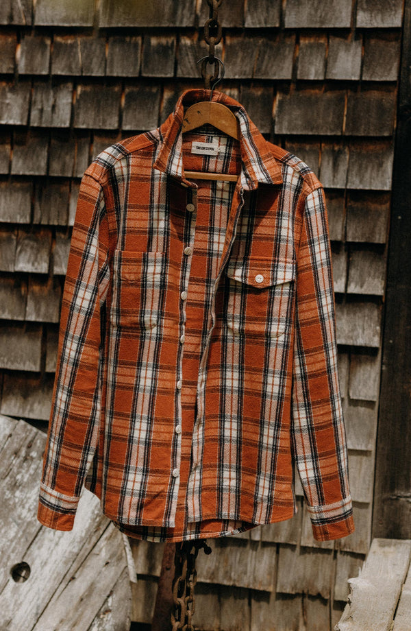 editorial image of The Crater Shirt in Brick Plaid hanging