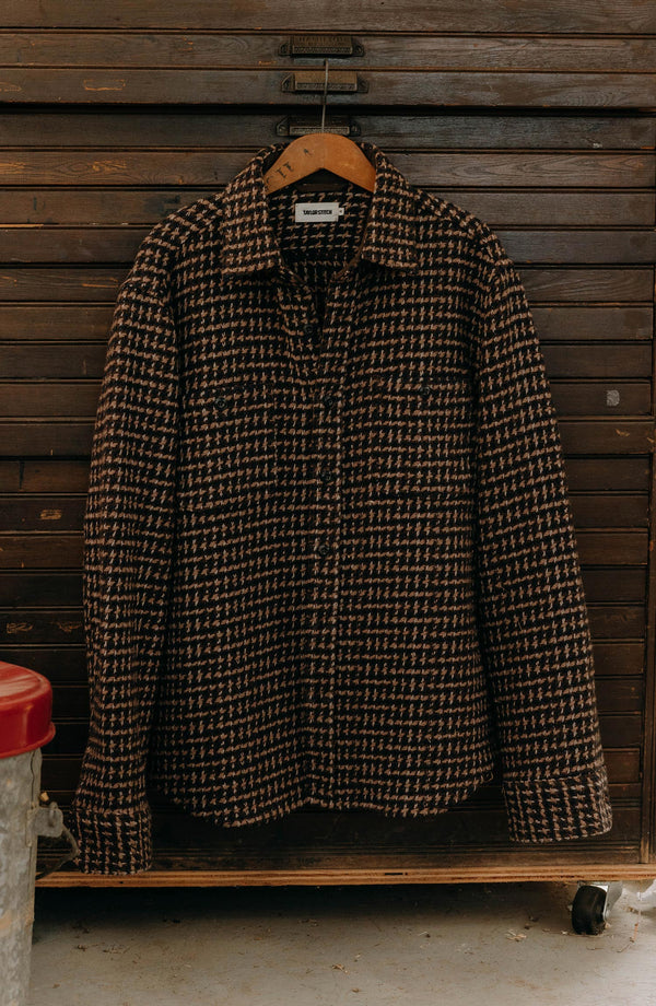 editorial image of The Cutter Overshirt in Timber Plaid hanging