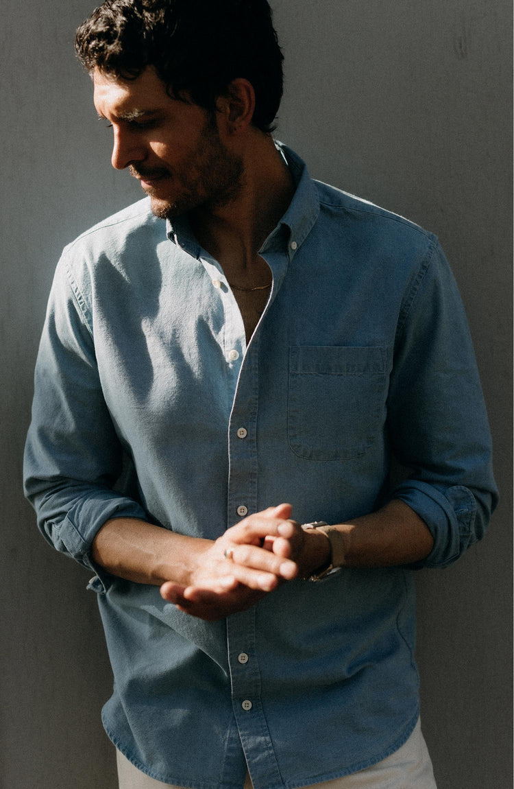 fit model with his arms crossed wearing The Jack in Washed Indigo Oxford