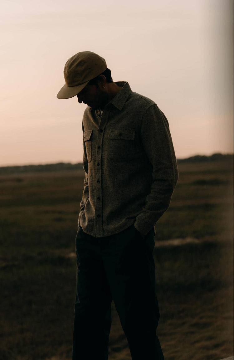 fit model posing in The Ledge Shirt in Army Linen Tweed