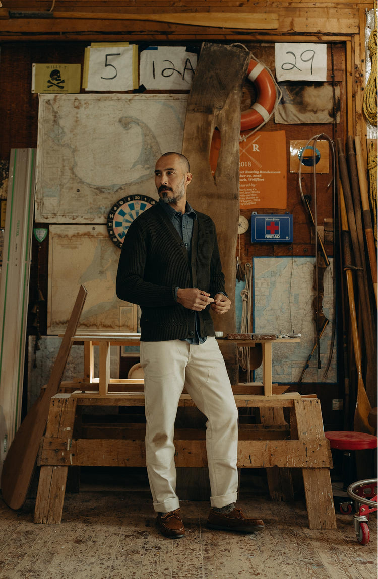 fit model posing in The Mariner Cardigan in Heather Loden Slub