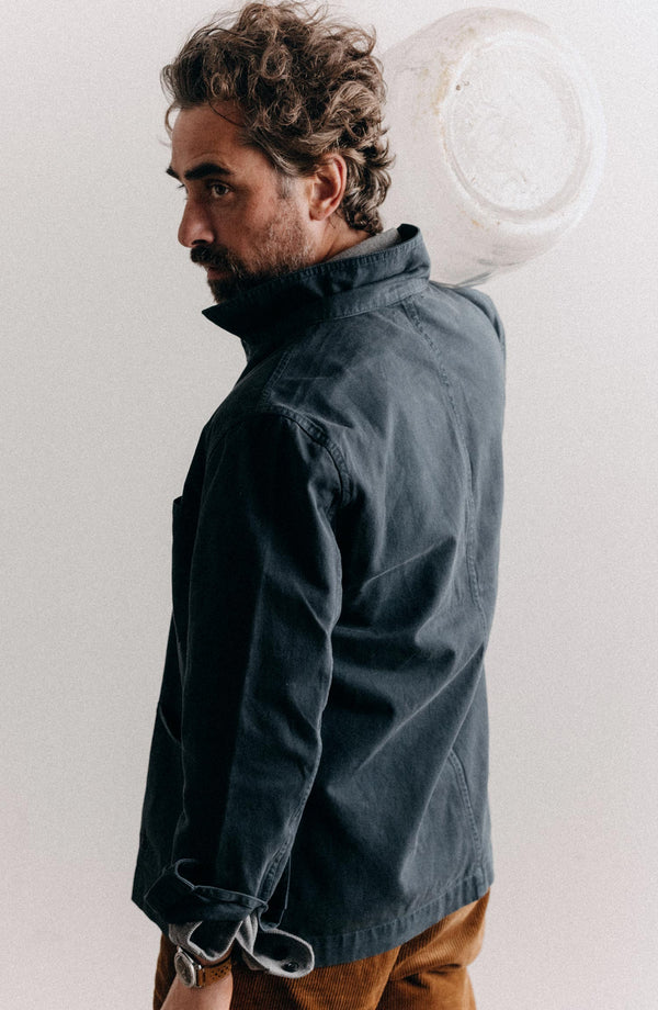 fit model adjusting The Ojai Jacket in Organic Navy Foundation Twill