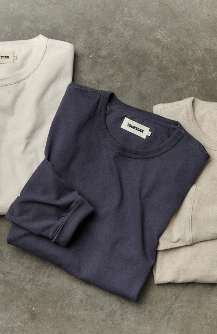 editorial flatlay of The Organic Cotton Long Sleeve Tee in Navy