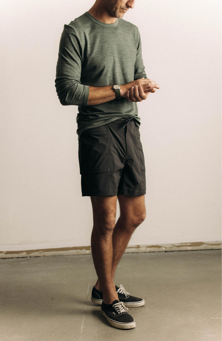 fit model showing off The Ridgeline Short in Coal