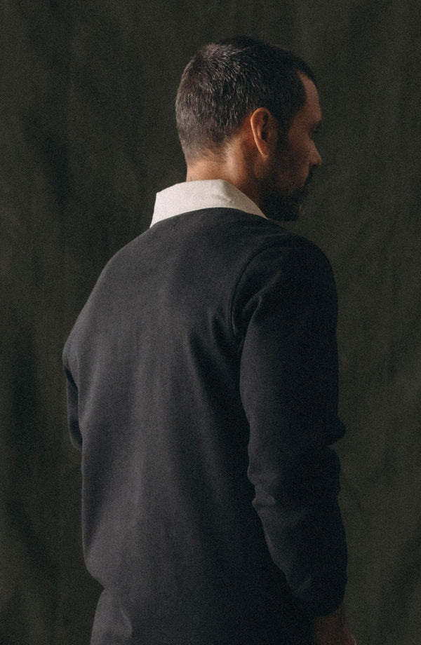 editorial image of The Rugby Shirt in Coal hanging