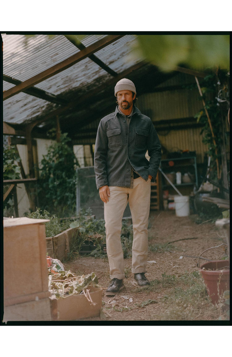 fit model walking wearing The Shop Shirt in Navy Chipped Canvas