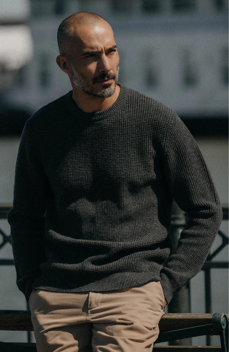 fit model posing in The Sidecountry Crew in Heather Graphite Merino Waffle