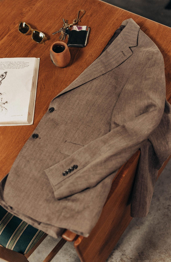 editorial flatlay of The Stevens Sportcoat in Coffee Linen Herringbone