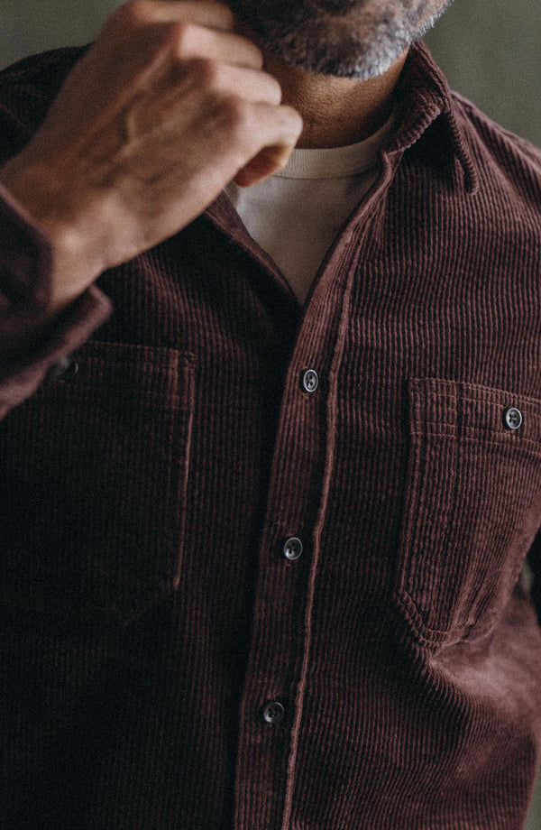 fit model with his hand in his pocket wearing The Utility Shirt in Burgundy Corduroy