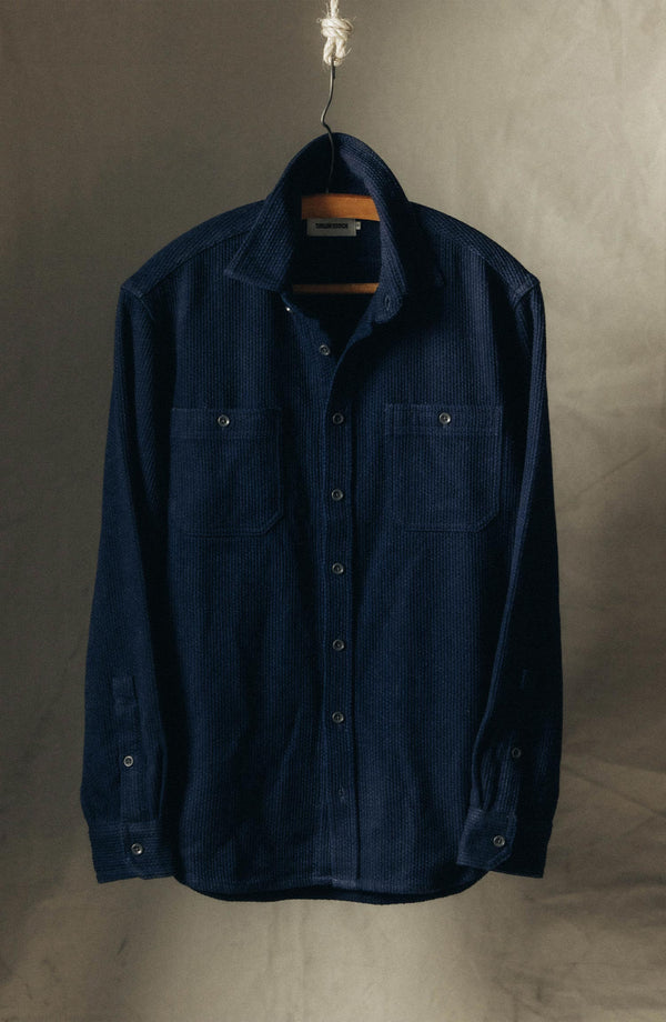 fit model showing off fabric on The Utility Shirt in Rinsed Indigo Sashiko