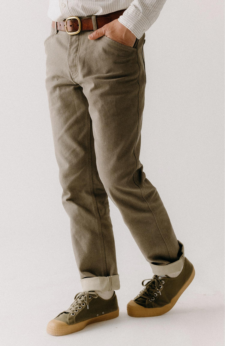 fit model sitting wearing The Camp Pant in Stone Chipped Canvas