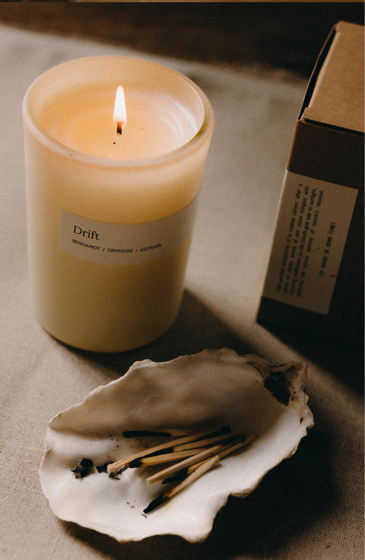 editorial image of The Candle in Drift burning