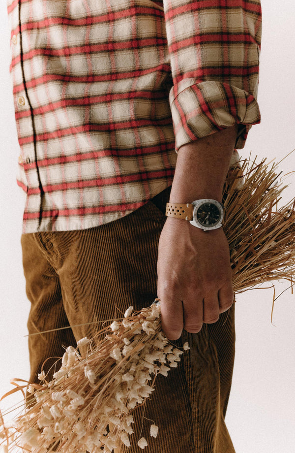 fit model showing off the bottom cuffs on The Carnegie Pant in Bourbon Corduroy