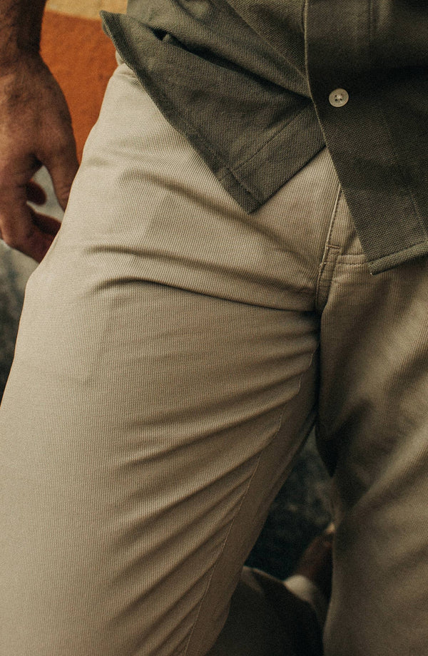 our fit model wearing the all daypant in maine—indoors—split shot