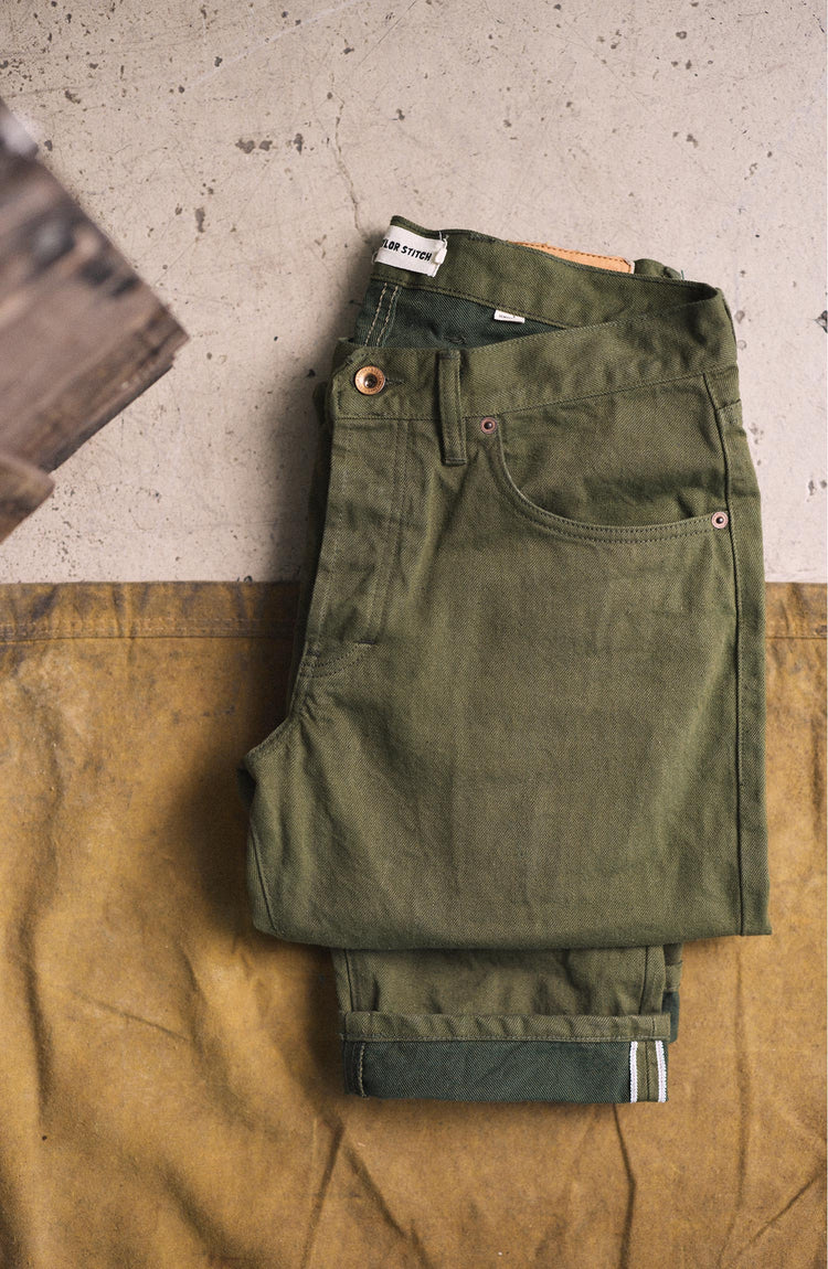 editorial image of folded The Democratic Jean in Olive Nihon Menpu Selvage