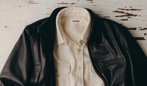 fit model taking photos wearing The Division Shirt in Birch