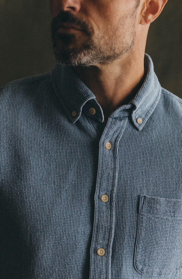fit model sitting wearing The Jack in Washed Indigo Waffle