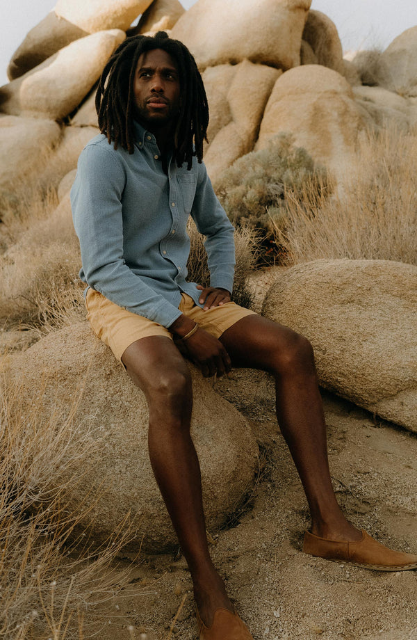 fit model sitting wearing The Jack in Washed Indigo Waffle