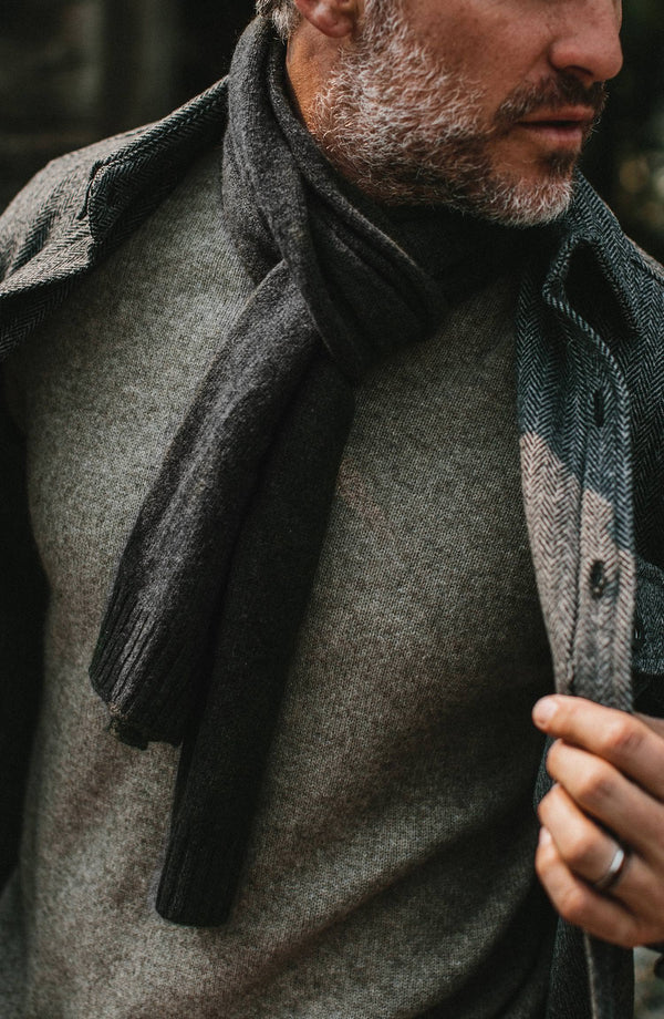 our guy in the mountains wearing the lodge—split shot