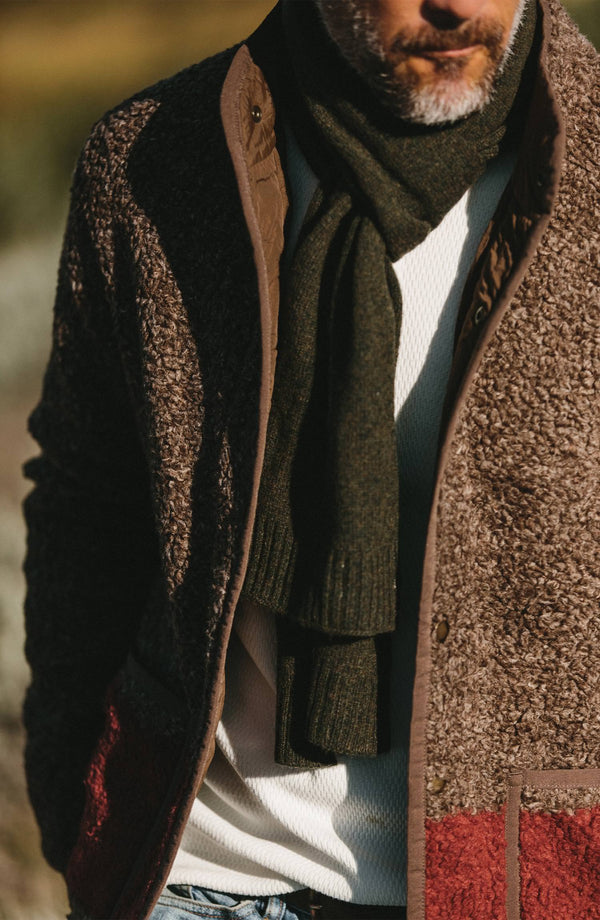 our guy in the mountains wearing the lodge—split shot