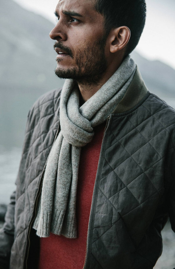 our guy in the mountains wearing the lodge—split shot