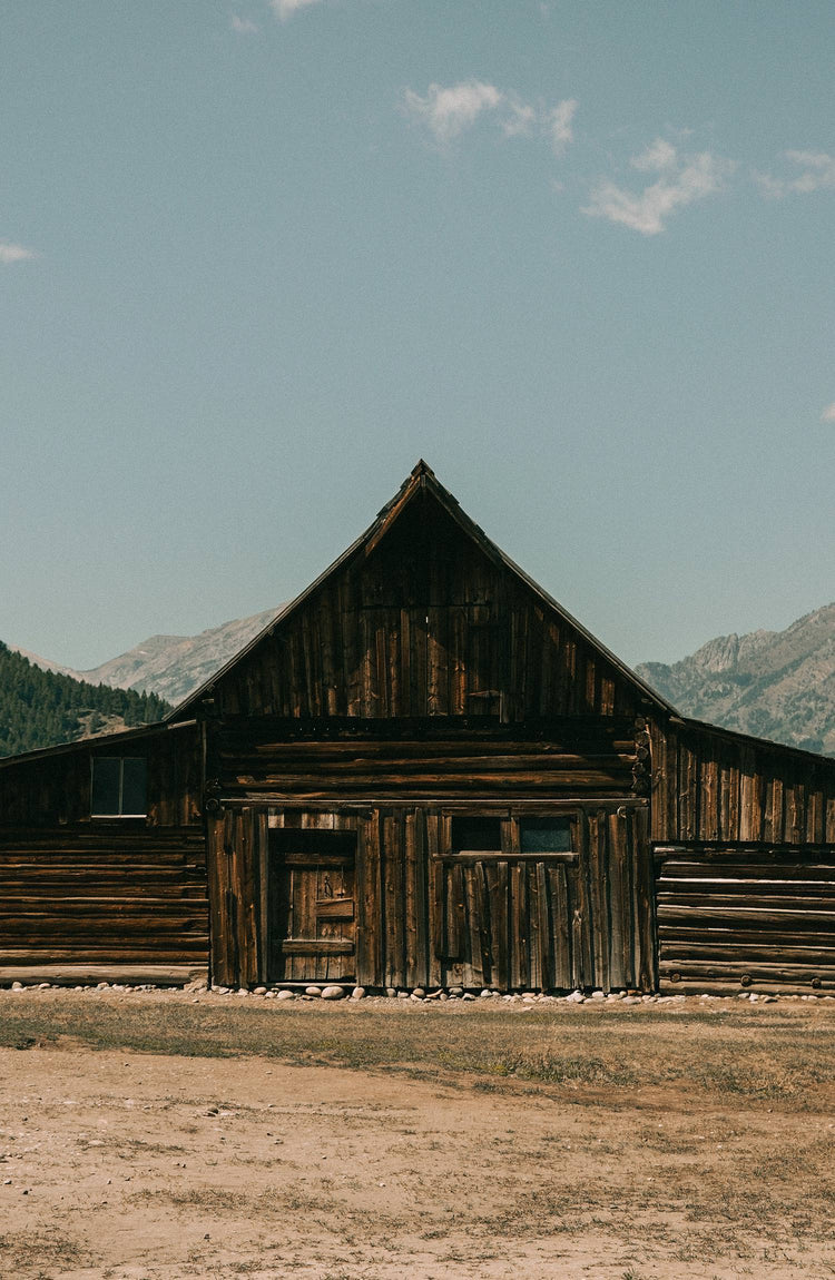 Shot of an old barn in a field in Jackson, Wyoming